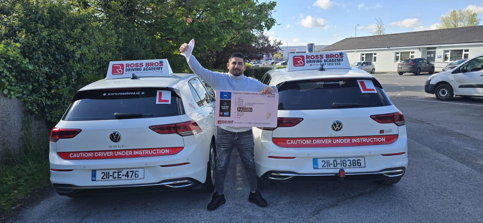 Happy learner celebrating a driving test pass